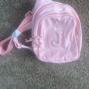 New (never used) Pink Kids belt bag with Initial 'J'
